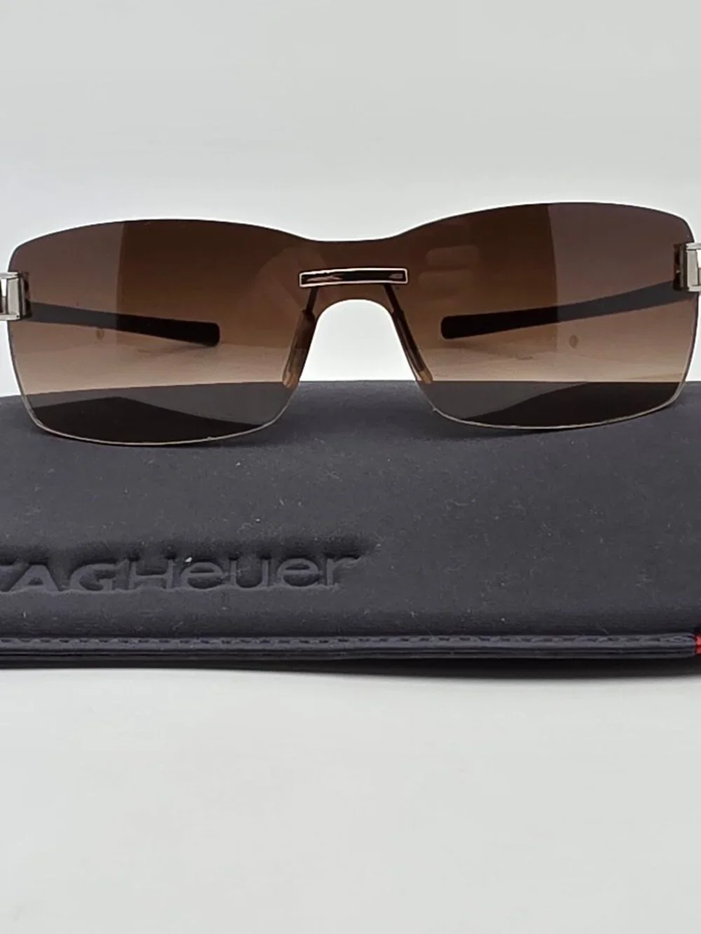 Tag Heuer TH7505 202 Brown Rubber Frame Brown Lens Rimless Sunglasses w/ Case